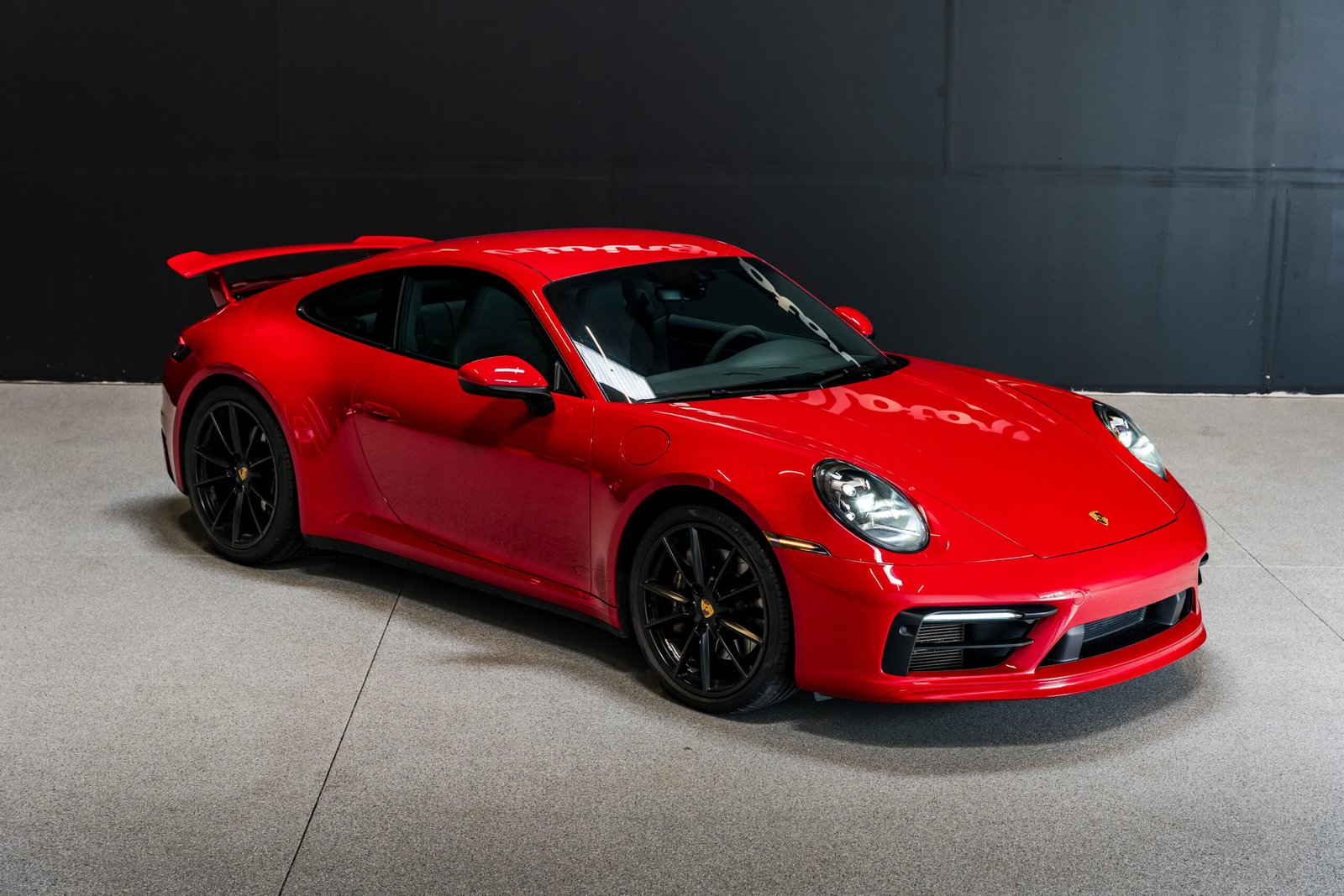 Red Porsche 911 Carrera rental at Sport Driving Motors in Kent, Washington