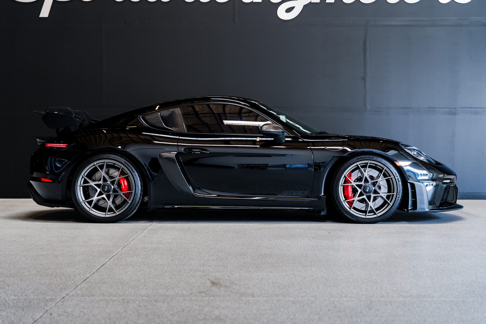 Porsche 718 Cayman GT4 RS rental Seattle front three quarter