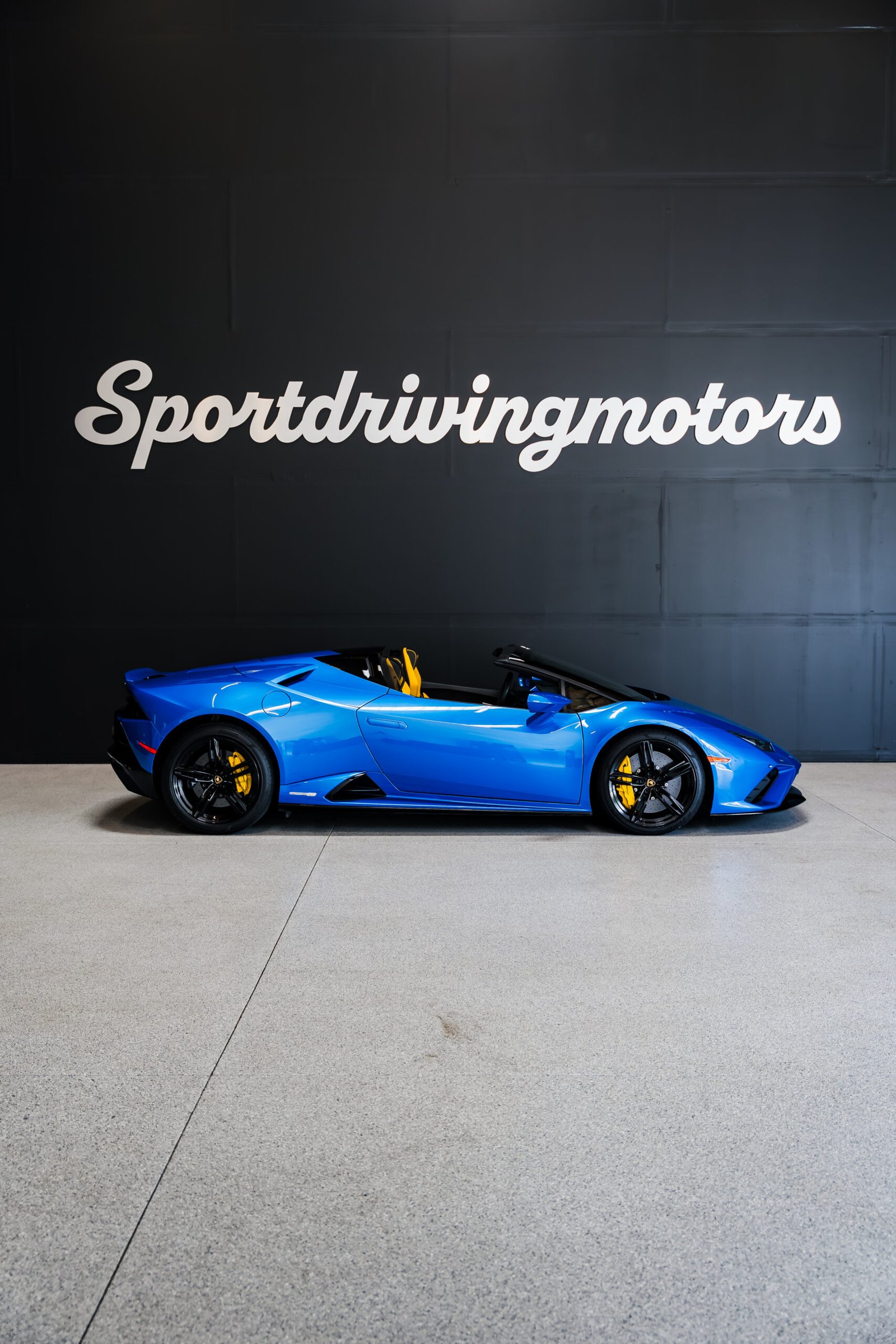 Blue Lamborghini Huracán EVO Spyder rental in Seattle from Sport Driving Motors