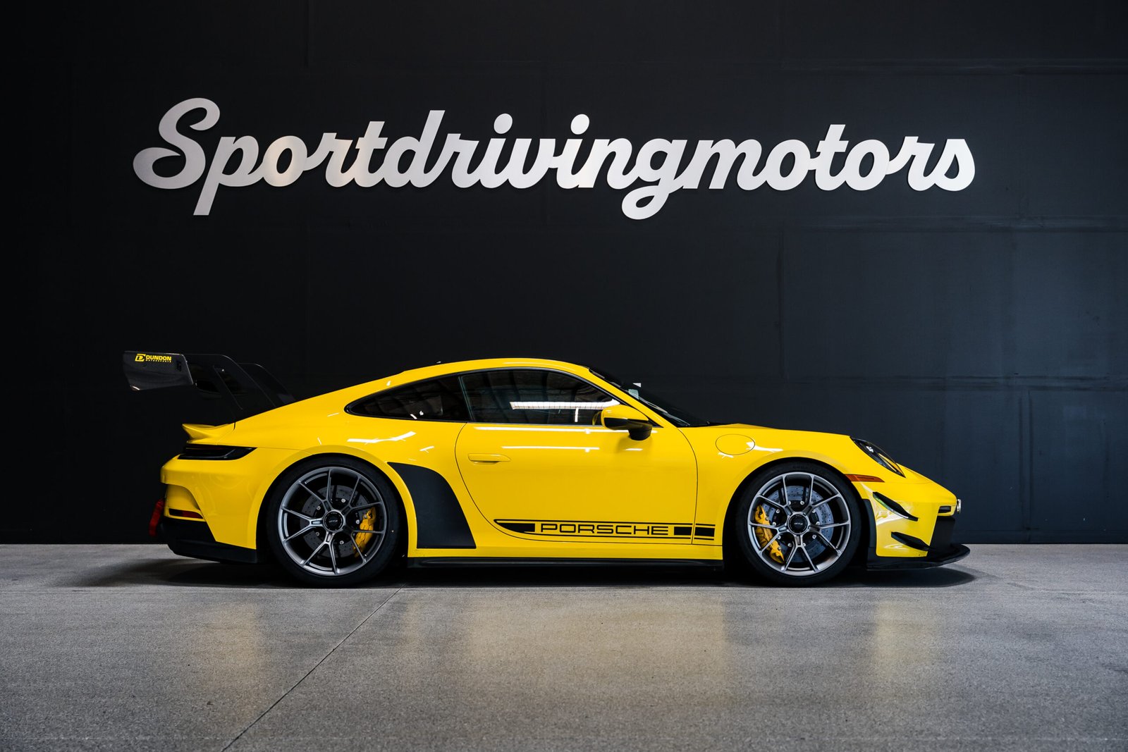 Yellow Porsche 992 GT3 rental Seattle front three quarter