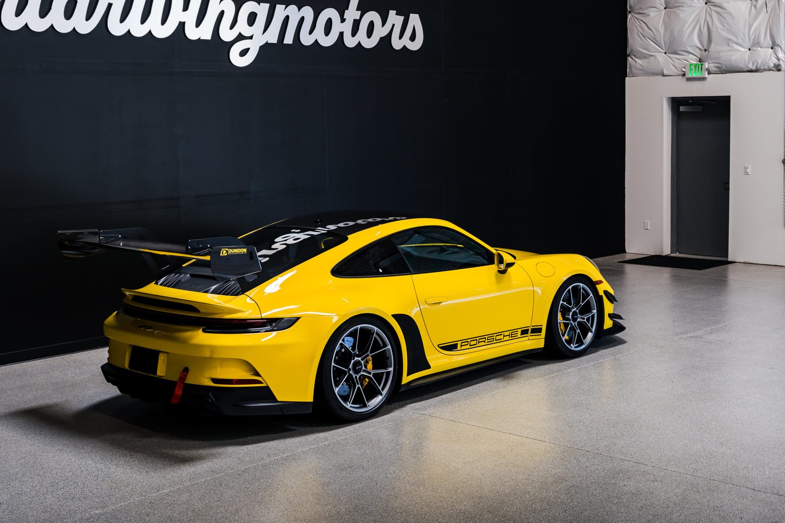 Dundon aero wing on a Porsche GT3 rental Seattle